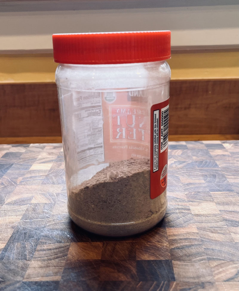 herbs in a peanut butter jar